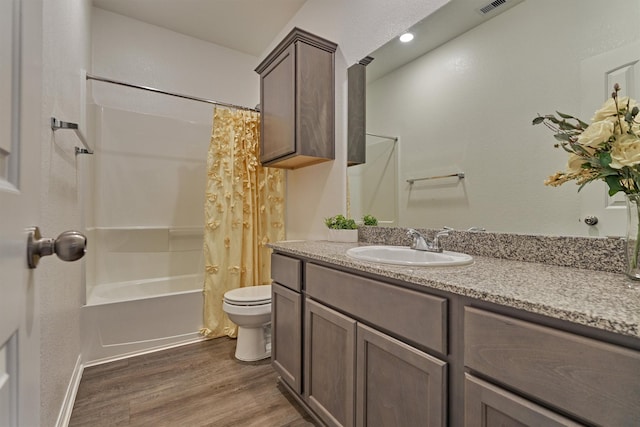 14208 Sedona Ridge Dr, Conroe, TX 77303 - full bath featuring vanity, wood finished floors, and shower / tub combo with curtain