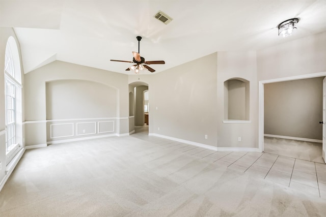 11510 Amber Canyon Dr, Houston, TX 77095 - spare room featuring a ceiling fan, carpet floors, arched walkways, and lofted ceiling