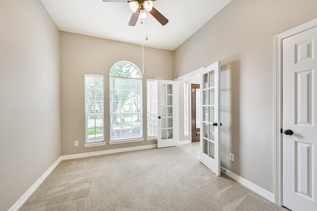 11510 Amber Canyon Dr, Houston, TX 77095 - carpeted empty room featuring french doors and a ceiling fan