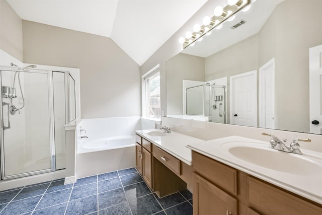 11510 Amber Canyon Dr, Houston, TX 77095 - full bathroom featuring double vanity, a shower stall, a garden tub, and lofted ceiling