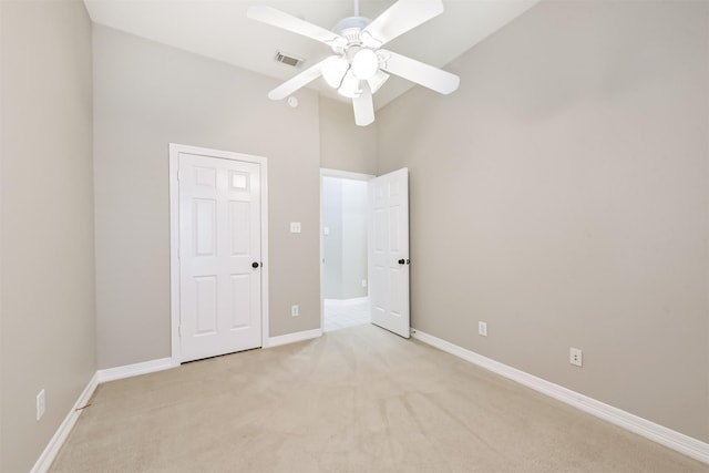11510 Amber Canyon Dr, Houston, TX 77095 - unfurnished bedroom featuring light colored carpet, high vaulted ceiling, and a ceiling fan