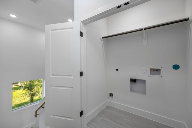 1711 Bardwell St, Houston, TX 77009 - washroom with hookup for an electric dryer, baseboards, washer hookup, and recessed lighting