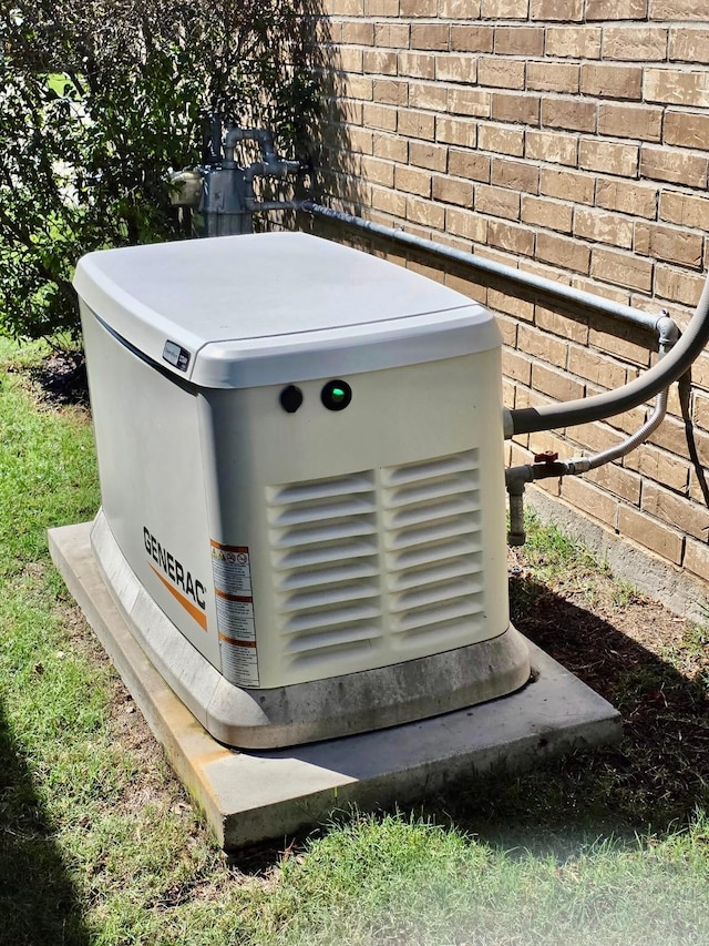 235 Ranch House Ln, Richmond, TX 77469 - exterior view of a power unit and brick siding