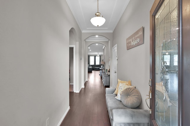 138 Verismo Ct, Montgomery, TX 77316 - hallway with arched walkways, dark wood finished floors, and ornamental molding