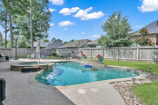 138 Verismo Ct, Montgomery, TX 77316 - view of swimming pool featuring a fenced backyard, a patio area, a residential view, and a pool with connected hot tub