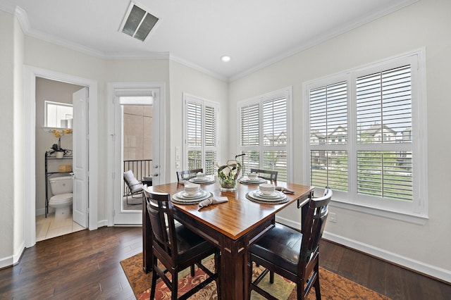 10812 Kyler Oaks Pl, Houston, TX 77043 - dining room featuring ornamental molding, dark wood finished floors, baseboards, and recessed lighting