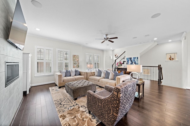 10812 Kyler Oaks Pl, Houston, TX 77043 - living room featuring ceiling fan, dark wood-type flooring, stairway, recessed lighting, and crown molding