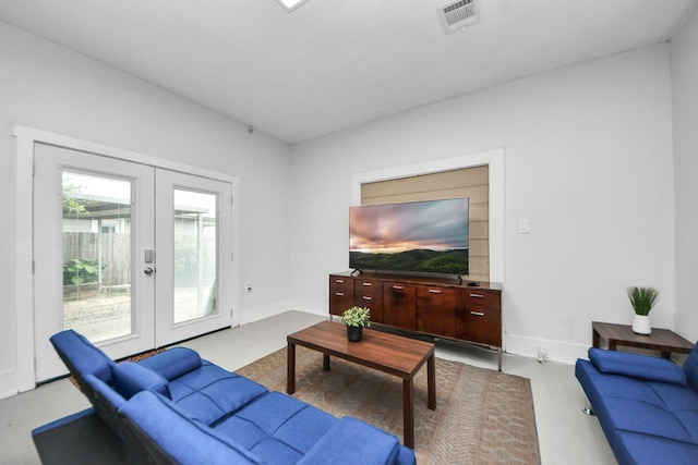 4409 Brady St, Houston, TX 77011 - living room featuring french doors and wood finished floors