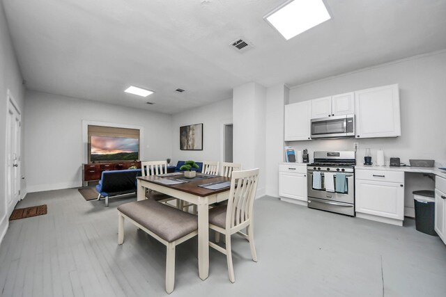 4409 Brady St, Houston, TX 77011 - dining room featuring baseboards