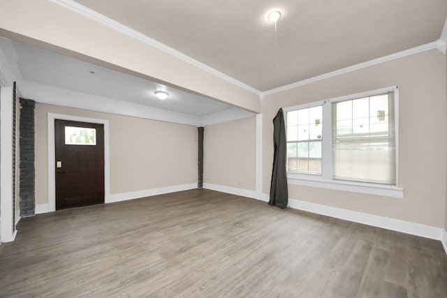 4409 Brady St, Houston, TX 77011 - entrance foyer with wood finished floors and ornamental molding
