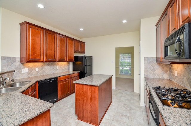 25314 Sandy Trace Ln, Katy, TX 77494 - kitchen with black appliances, a kitchen island, light tile patterned floors, tasteful backsplash, and recessed lighting