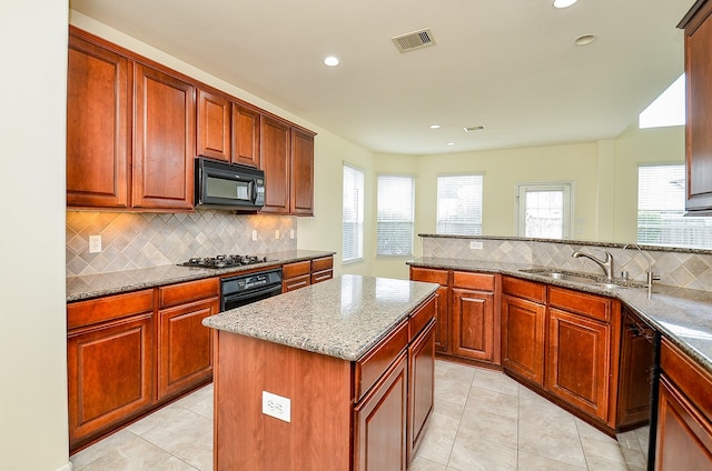 25314 Sandy Trace Ln, Katy, TX 77494 - kitchen featuring black appliances, stone counters, light tile patterned floors, decorative backsplash, and recessed lighting