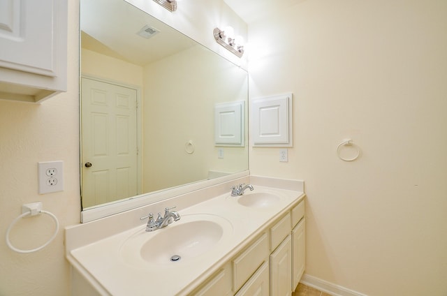 25314 Sandy Trace Ln, Katy, TX 77494 - bathroom with double vanity and baseboards