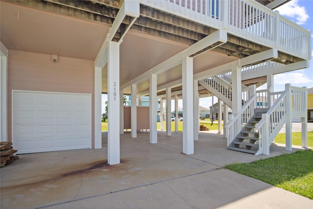 3101 Diane, Crystal Beach, TX 77650 - view of patio with a carport, stairway, and an attached garage