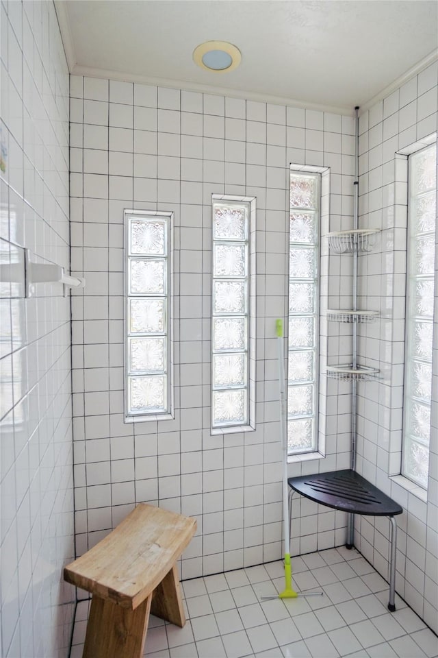 3101 Diane, Crystal Beach, TX 77650 - bathroom featuring tile walls and tile patterned floors