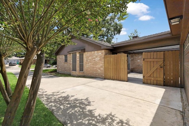 10518 Sageburrow Dr, Houston, TX 77089 - view of property exterior with brick siding