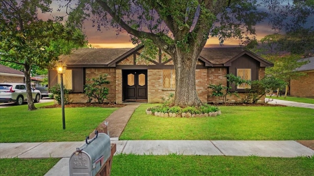 10518 Sageburrow Dr, Houston, TX 77089 - mid-century inspired home featuring a yard and brick siding