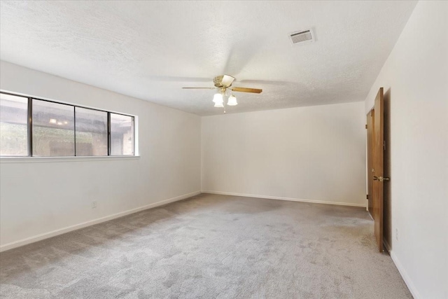 10518 Sageburrow Dr, Houston, TX 77089 - spare room featuring a ceiling fan, carpet floors, baseboards, and a textured ceiling