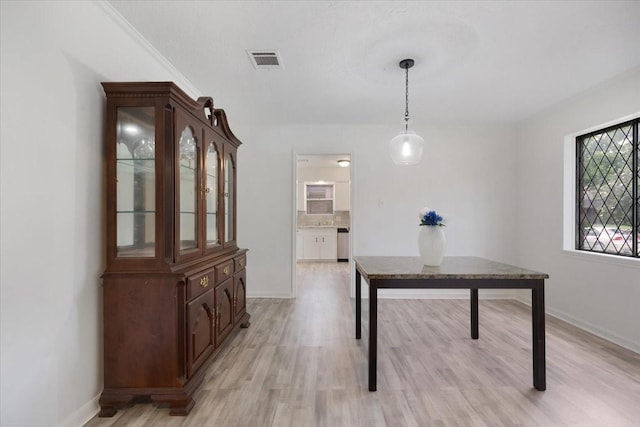 10518 Sageburrow Dr, Houston, TX 77089 - dining space featuring light wood-style floors and baseboards