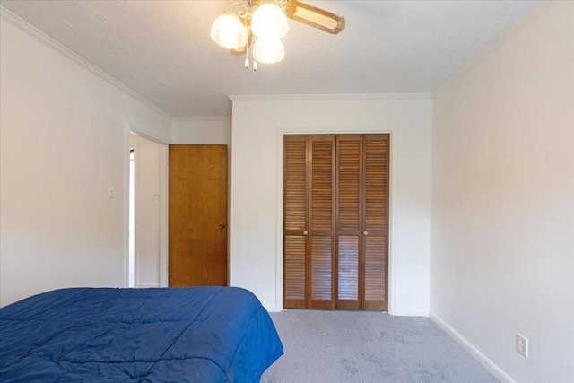 10518 Sageburrow Dr, Houston, TX 77089 - bedroom featuring carpet floors, a closet, crown molding, baseboards, and ceiling fan