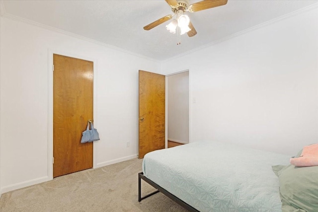 10518 Sageburrow Dr, Houston, TX 77089 - bedroom featuring ornamental molding, carpet floors, a ceiling fan, and baseboards