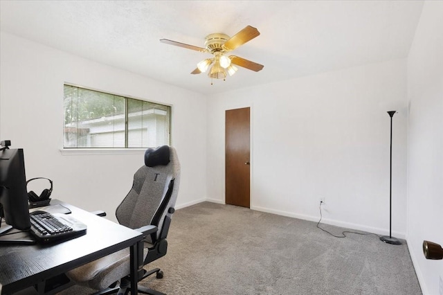 10518 Sageburrow Dr, Houston, TX 77089 - home office with carpet flooring, a ceiling fan, and baseboards