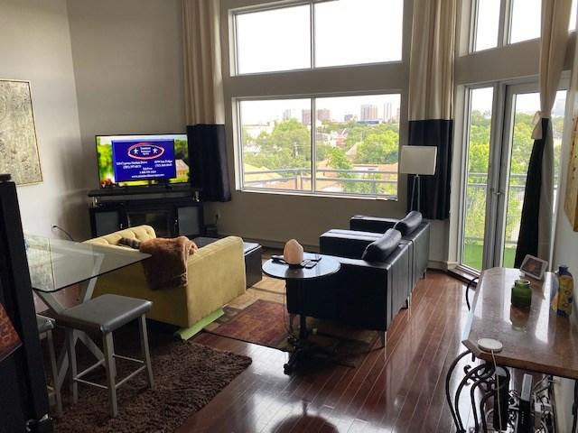3311 Yupon St Unit 517, Houston, TX 77006 - living room featuring hardwood / wood-style floors