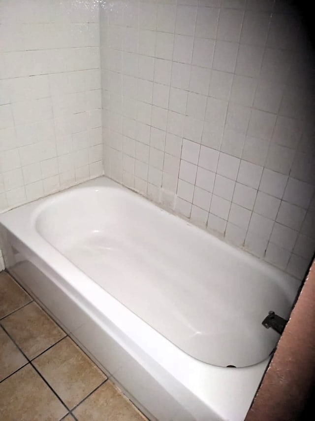 8421 Hearth Dr Unit 21, Houston, TX 77054 - full bath with tile patterned floors and a tub to relax in