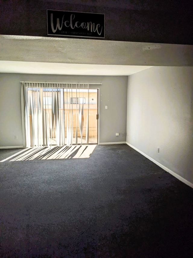 8421 Hearth Dr Unit 21, Houston, TX 77054 - unfurnished room with carpet and baseboards
