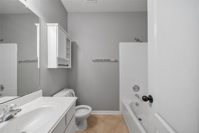 24910 Crystal Stone Ln, Katy, TX 77494 - bathroom featuring vanity, tile patterned floors, and shower / bathtub combination