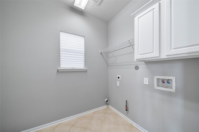 24910 Crystal Stone Ln, Katy, TX 77494 - washroom with hookup for a gas dryer, hookup for a washing machine, hookup for an electric dryer, and cabinet space