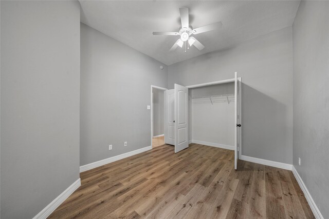 24910 Crystal Stone Ln, Katy, TX 77494 - unfurnished bedroom featuring wood finished floors, a closet, and ceiling fan