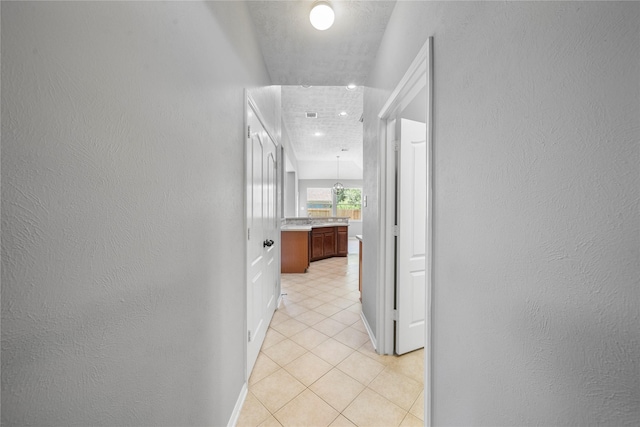 24910 Crystal Stone Ln, Katy, TX 77494 - hallway featuring light tile patterned floors
