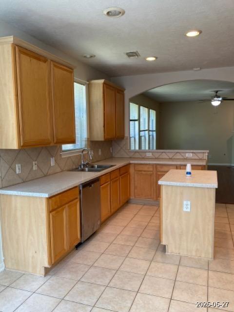 151 Prairie Dawn Cir, Conroe, TX 77385 - kitchen featuring a sink, stainless steel dishwasher, light countertops, ceiling fan, and recessed lighting