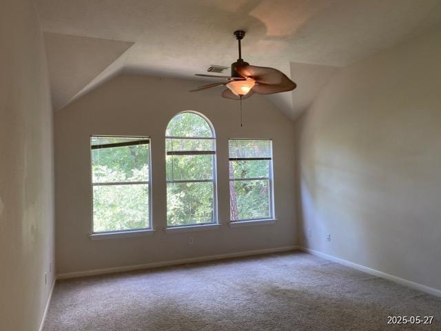 151 Prairie Dawn Cir, Conroe, TX 77385 - carpeted empty room featuring ceiling fan, vaulted ceiling, and baseboards