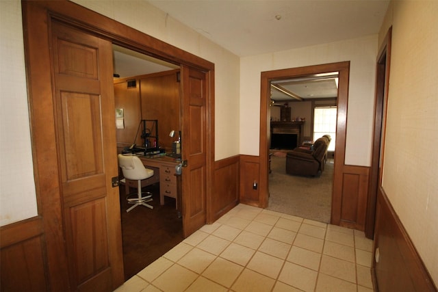 32226 Divot Dr, Waller, TX 77484 - hallway featuring a desk, light colored carpet, and wainscoting