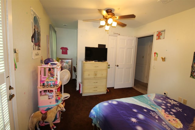 32226 Divot Dr, Waller, TX 77484 - bedroom with dark carpet and a ceiling fan