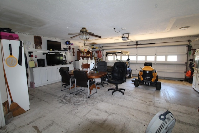 32226 Divot Dr, Waller, TX 77484 - garage featuring a garage door opener and ceiling fan