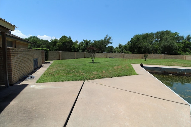 32226 Divot Dr, Waller, TX 77484 - view of yard featuring a patio