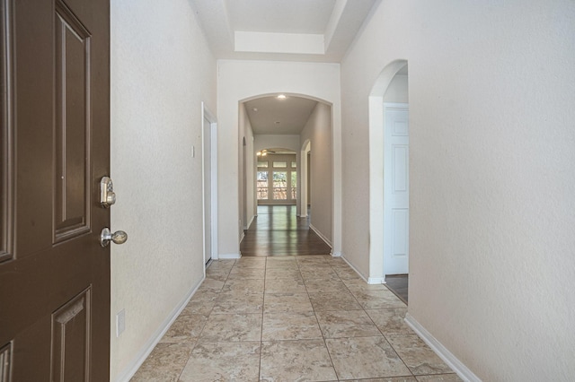 6843 Oaken Gate Way, Humble, TX 77338 - hall featuring arched walkways and baseboards