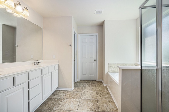 6843 Oaken Gate Way, Humble, TX 77338 - bathroom featuring double vanity and a bath