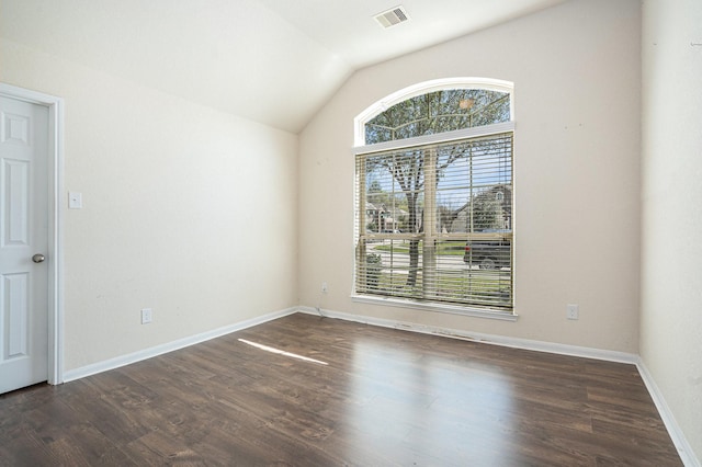 6843 Oaken Gate Way, Humble, TX 77338 - unfurnished room featuring vaulted ceiling and dark wood-type flooring