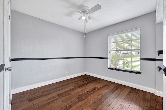 11703 Teaneck Dr, Houston, TX 77089 - unfurnished room featuring baseboards, hardwood / wood-style floors, and a ceiling fan