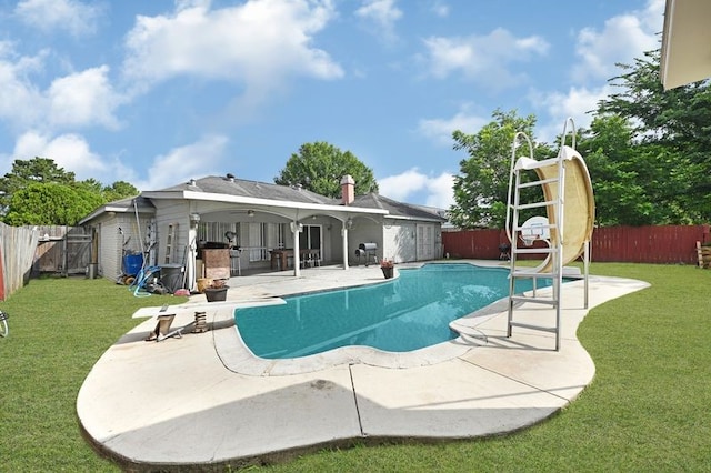 11703 Teaneck Dr, Houston, TX 77089 - view of pool featuring a water slide and a patio