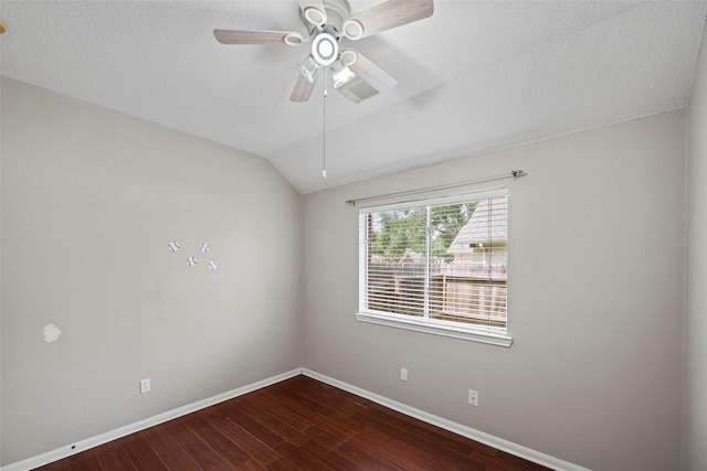 21055 Southern Colony Ct, Katy, TX 77449 - spare room with dark wood-type flooring, ceiling fan, and lofted ceiling