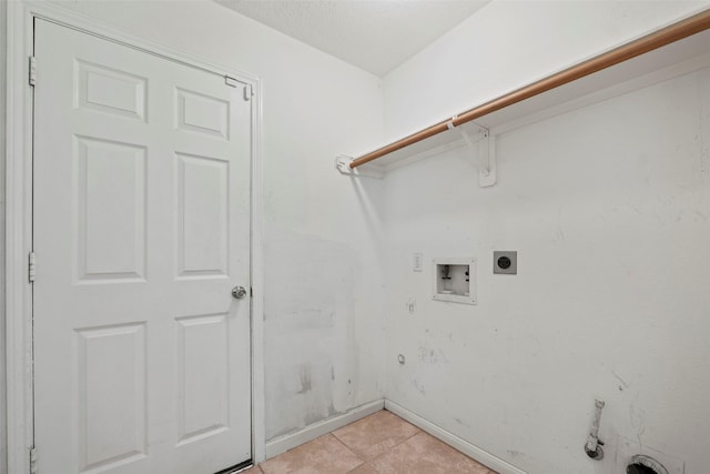 21055 Southern Colony Ct, Katy, TX 77449 - washroom with hookup for an electric dryer, washer hookup, light tile patterned floors, and hookup for a gas dryer
