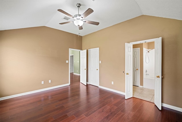 21055 Southern Colony Ct, Katy, TX 77449 - unfurnished bedroom with vaulted ceiling, wood finished floors, and ceiling fan