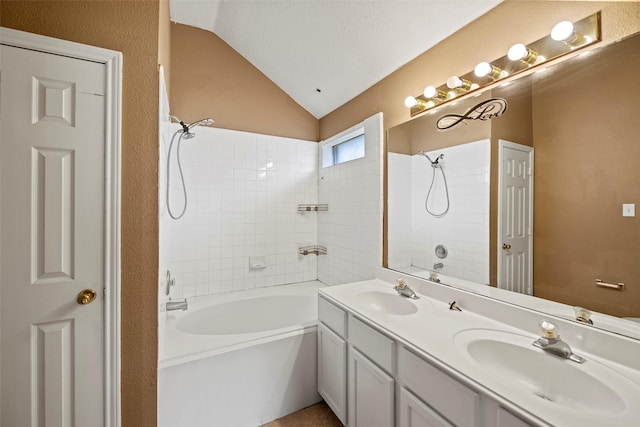 21055 Southern Colony Ct, Katy, TX 77449 - bathroom with bathing tub / shower combination, lofted ceiling, and double vanity