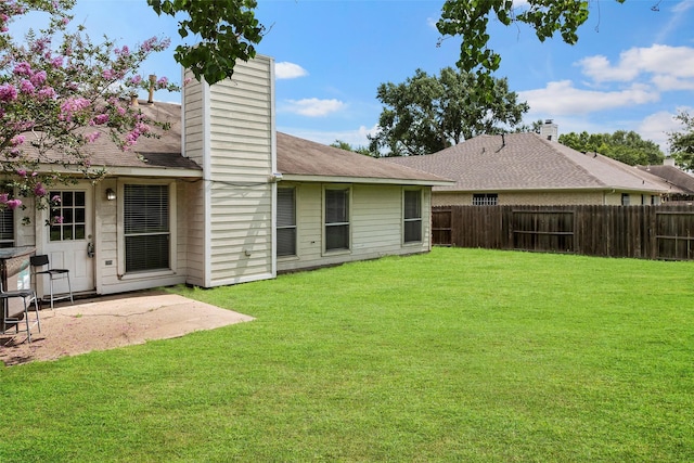 21055 Southern Colony Ct, Katy, TX 77449 - rear view of property with a chimney, a patio area, and a shingled roof