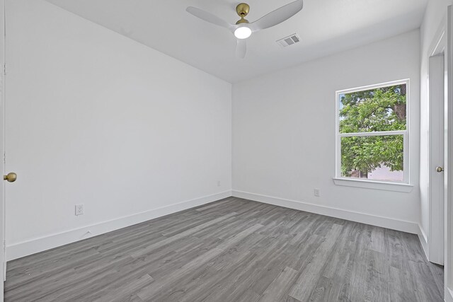 2332 Wavell St, Houston, TX 77088 - spare room featuring wood finished floors and ceiling fan